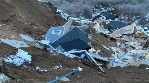 DRAPER, UTAH (AP) — Two dangerously unstable homes whose occupants were ordered to evacuate six months ago collapsed down a hill Saturday in suburban Salt Lake City. No one was injured when the unoccupied houses on the edge of the hill broke apart early in the day in Draper, about 20 miles south of Salt Lake City. 